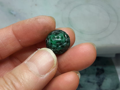 Dark green jade bead