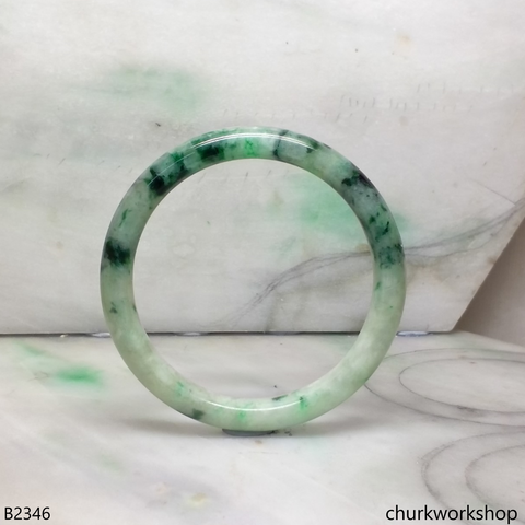 Light green with splotches dark green jade bangle