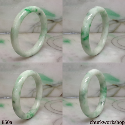 White base with green splotches jade bangle