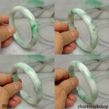 White base with green splotches jade bangle