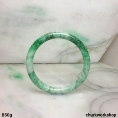Light green with splotches bluish green jade bangle