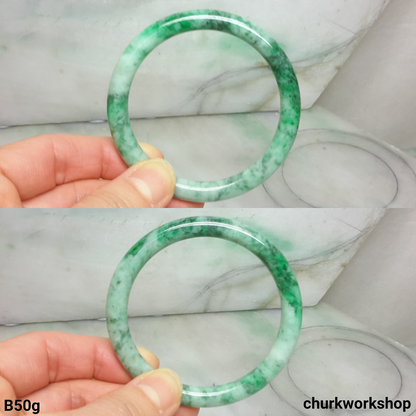 Light green with splotches bluish green jade bangle