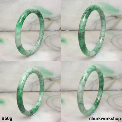Light green with splotches bluish green jade bangle