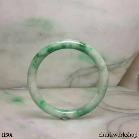 Light green with splotches dark green jade bangle