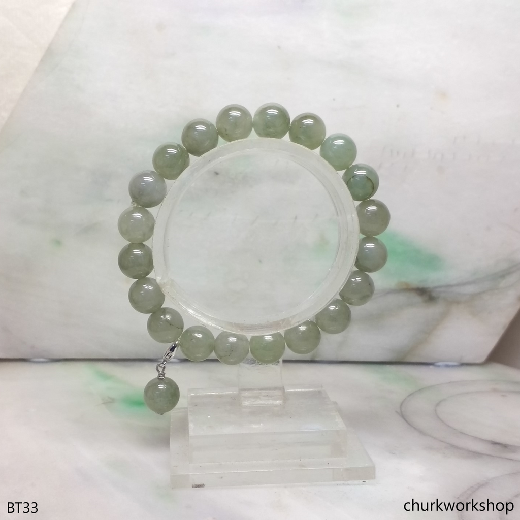 Light green beads jade bracelet with small charm