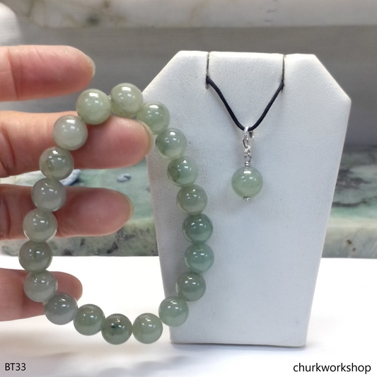 Light green beads jade bracelet with small charm