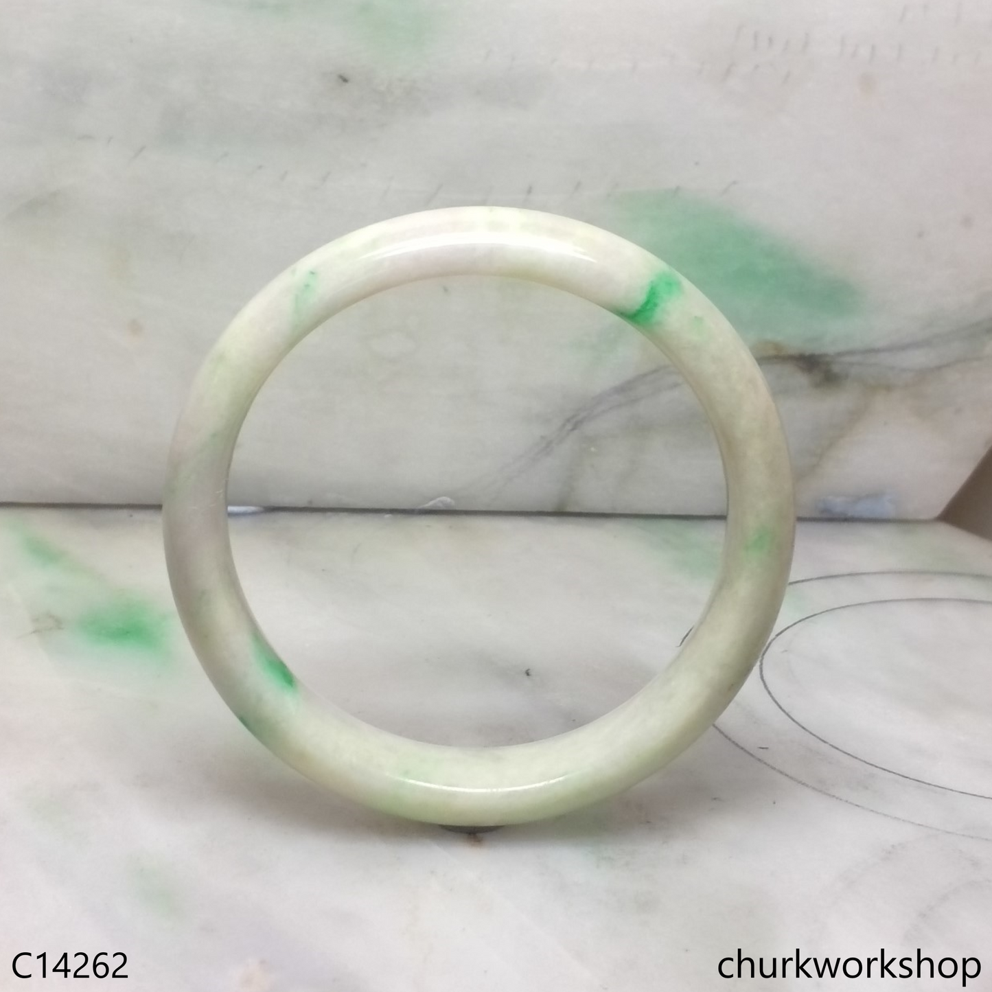 Pale green with splotches lavender jade bangle