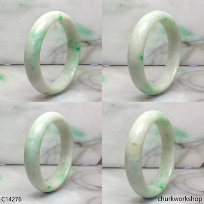 White base with splotches apple green jade bangle