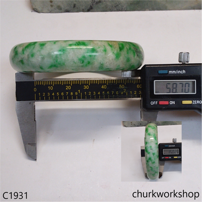 Pale yellowish base with green splotches  jade bangle