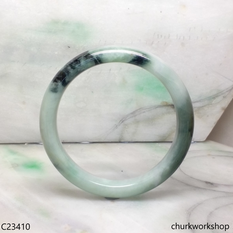 Large light green with splotches dark and bluish green jade bangle
