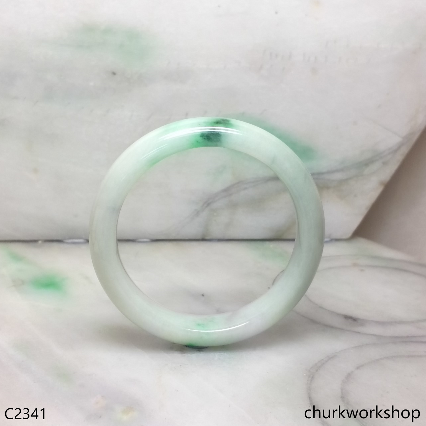 White base with splotches apple green  jade bangle