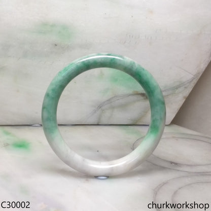 White base with splotches green jade bangle