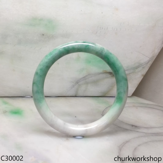 White base with splotches green jade bangle