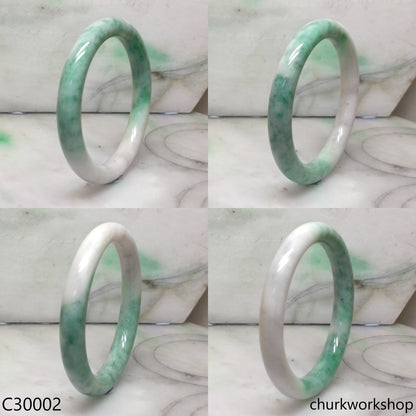 White base with splotches green jade bangle