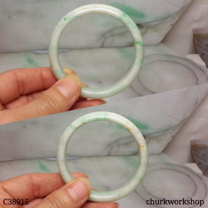 White base with splotches green jade bangle