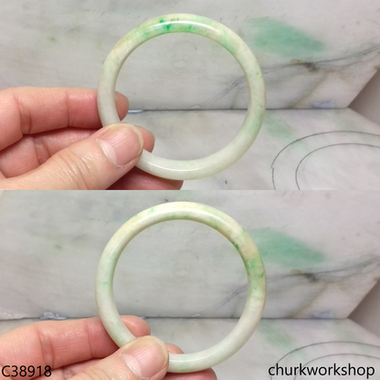 Small light green base with splotches apple green jade bangle