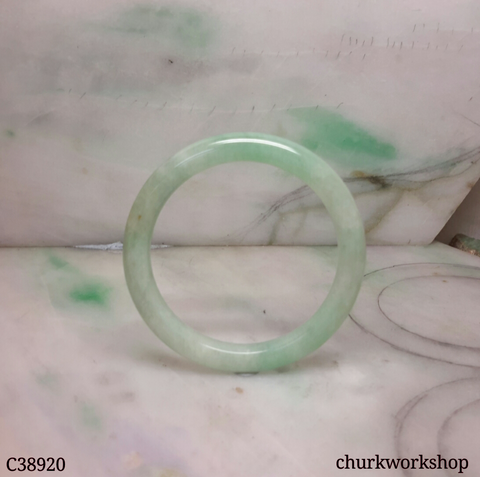 Small light green base with splotches green jade bangle