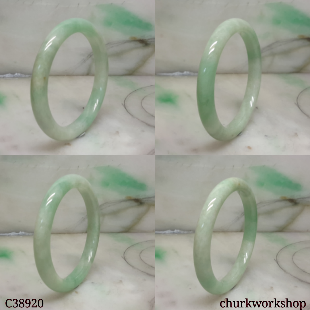 Small light green base with splotches green jade bangle
