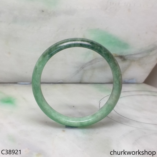 Small green base with splotches bluish green jade bangle