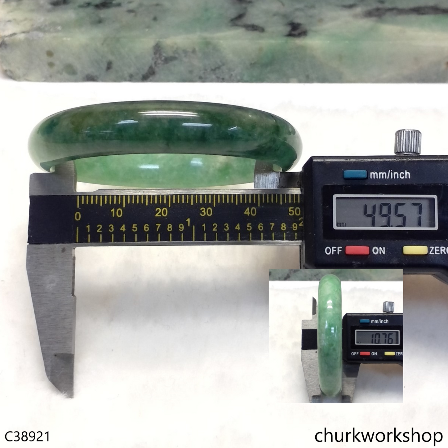 Small green base with splotches bluish green jade bangle