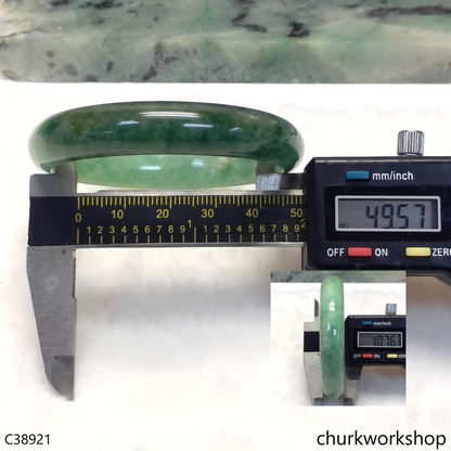 Small green base with splotches bluish green jade bangle