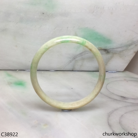 Pale yellowish base with green jade bangle