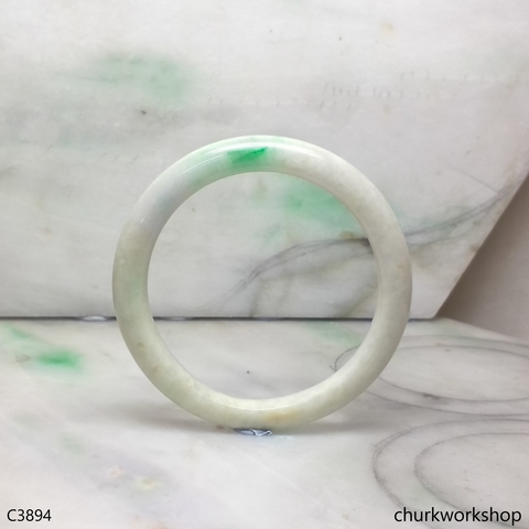 White base with splotches green jade bangle