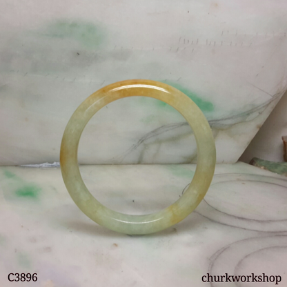 Small light green base with splotches red jade bangle