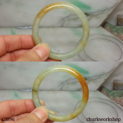 Small light green base with splotches red jade bangle