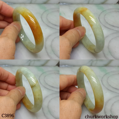 Small light green base with splotches red jade bangle