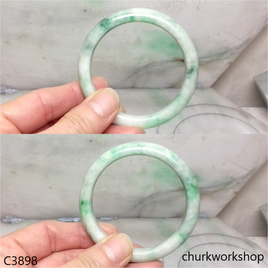 White base with splotches green jade bangle