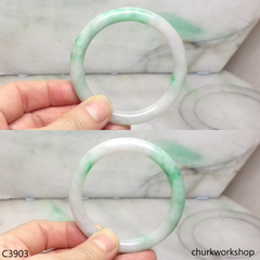 Pale lavender base with green bangle