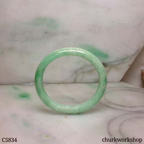 Small light apple green jade oval bangle