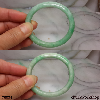 Small light apple green jade oval bangle