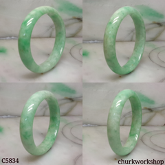 Small light apple green jade oval bangle