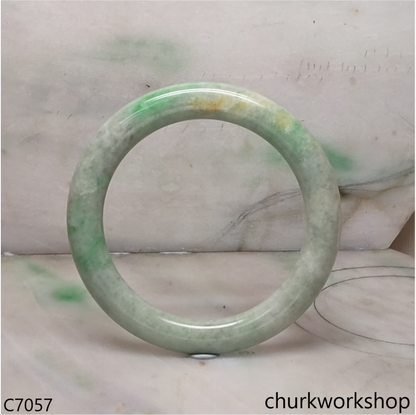 Large light green with splotches green jade bangle