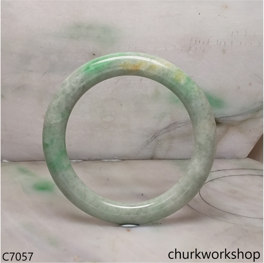 Large light green with splotches green jade bangle