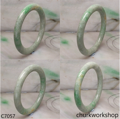 Large light green with splotches green jade bangle