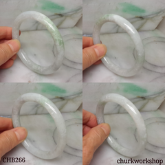 White base with splotches green jade bangle