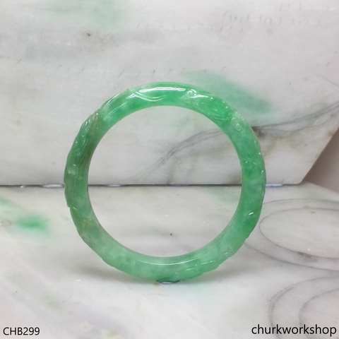 Small carved green jade bangle