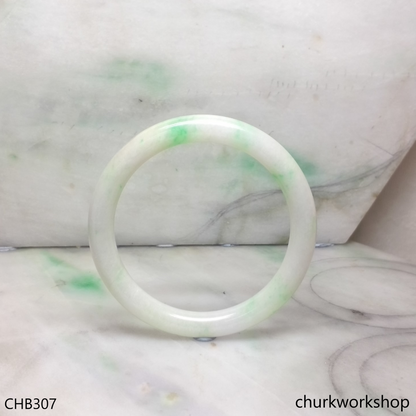 White base with splotches green jade bangle