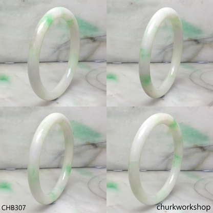 White base with splotches green jade bangle