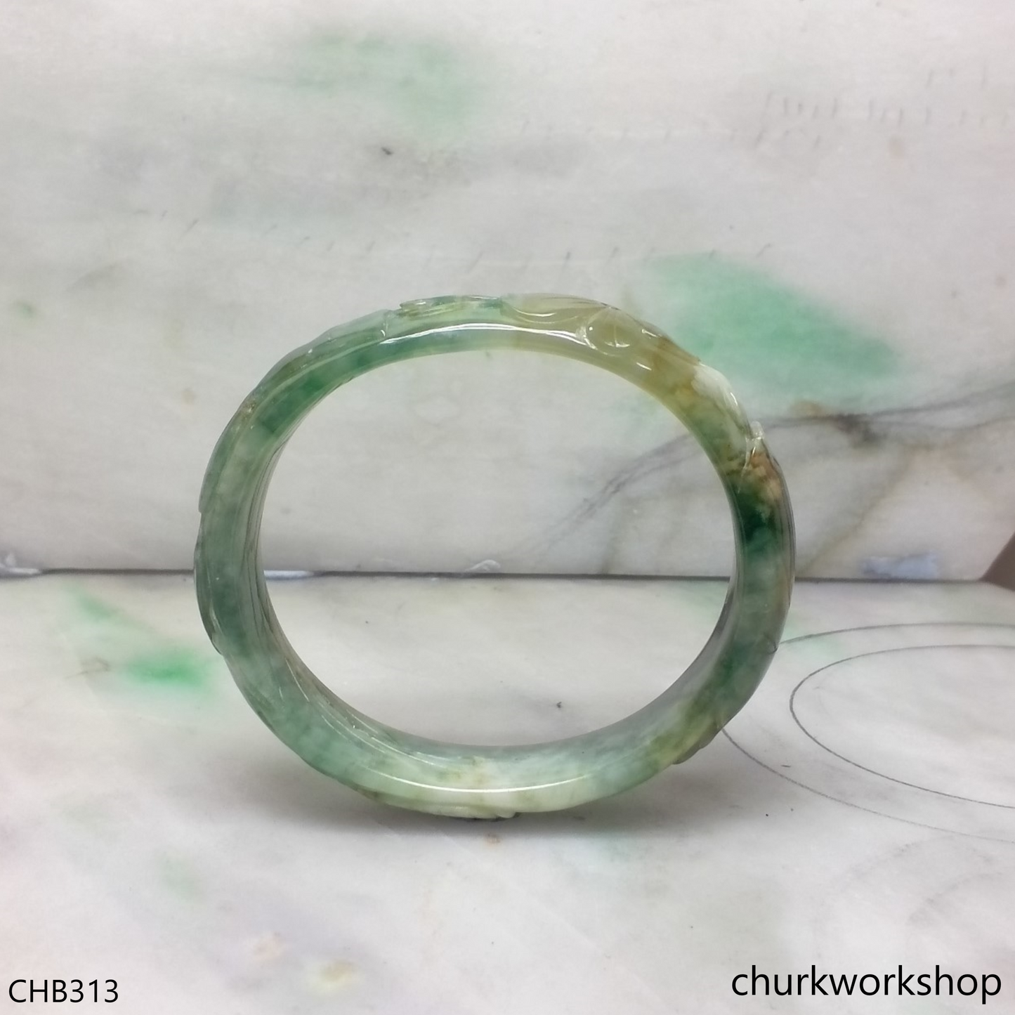 Multi-color carved oval jade bangle
