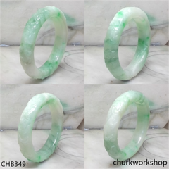 Light green carved jade bangle