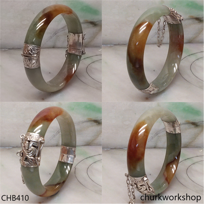 Bluish green with red splotches red  hinges jade bangle