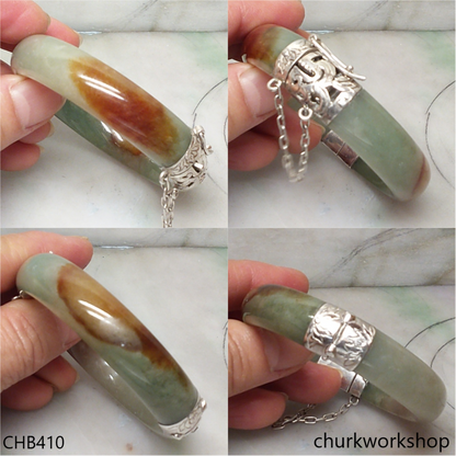 Bluish green with red splotches red  hinges jade bangle