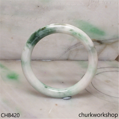 White base with splotches bluish green jade bangle