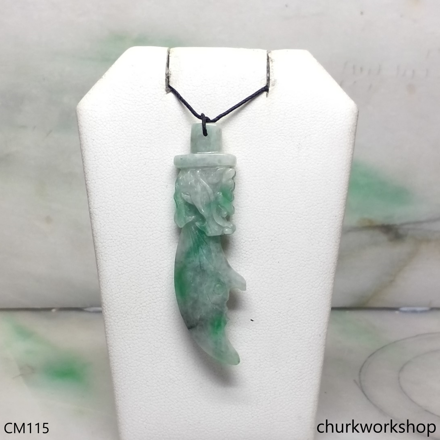 Dragon blade jade pendant