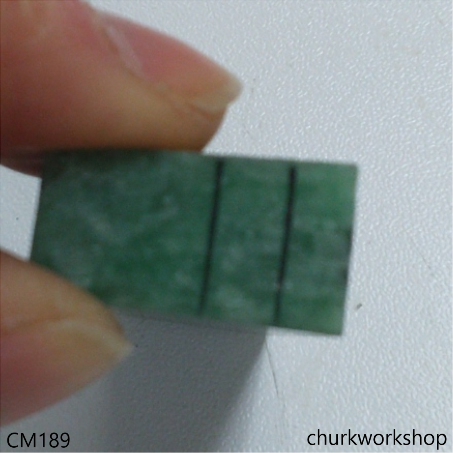 Custom cut jade fish earrings