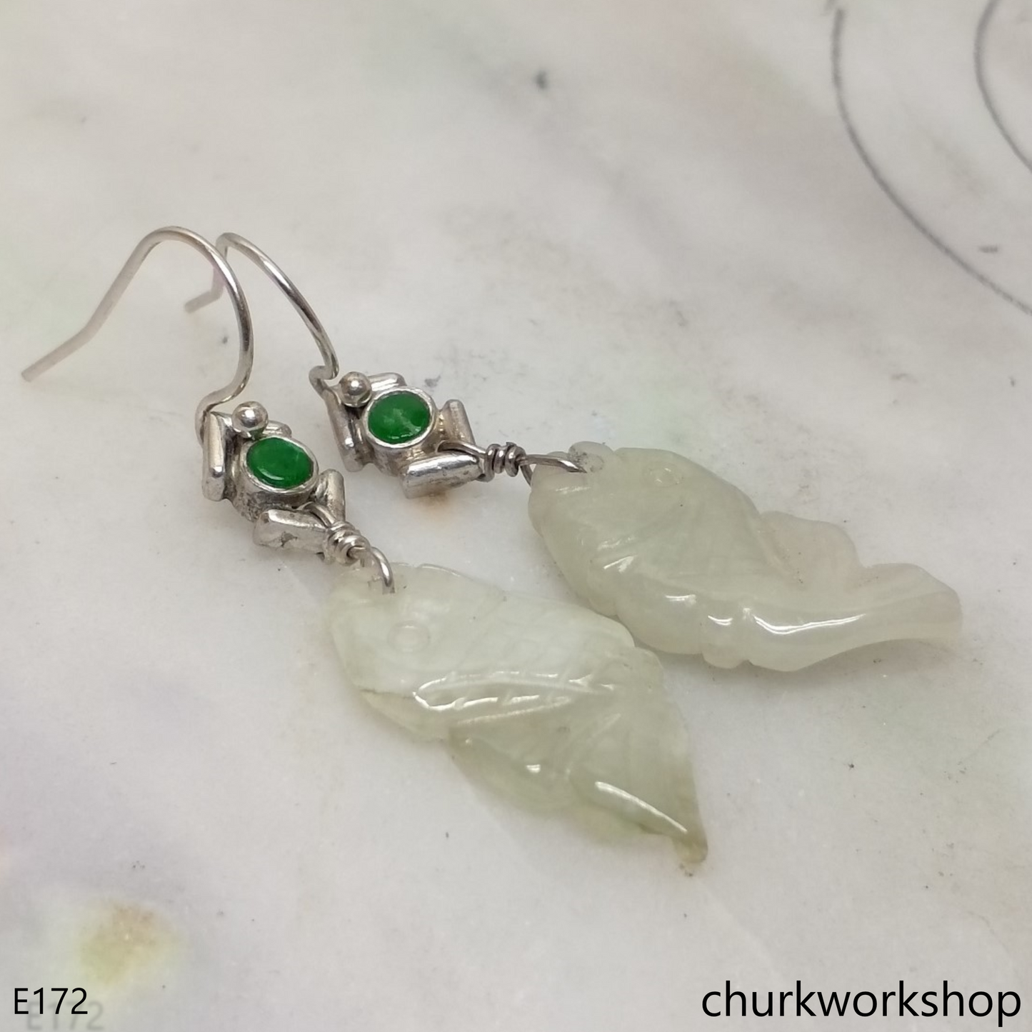 Pale green jade fish earrings